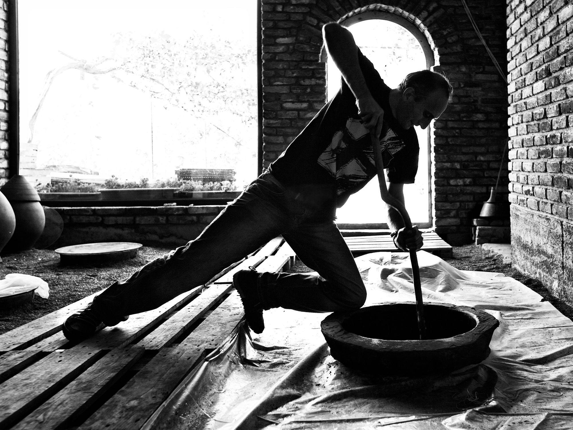 Iago Bitarishvili cleaning a kvevri